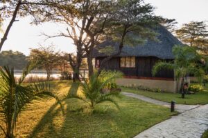 Okavango River chalet at Hakusembe River Lodge near sunset