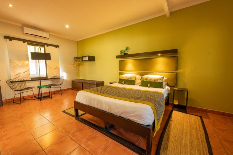 Namib Desert Lodge bedroom and seating area