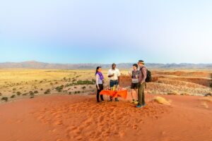 Guests on a dune activity from Namib Desert Lodge