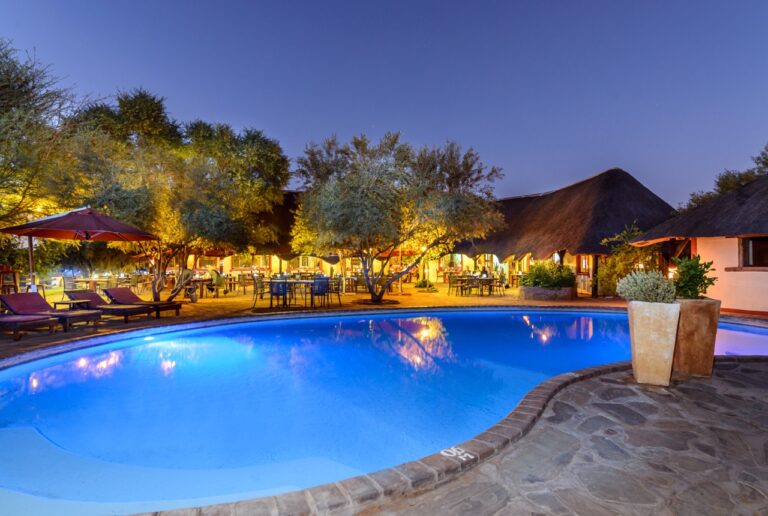 Swimming pool illuminated at Namib Desert Lodge
