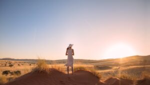 Guest watching the Namib sunset near the lodge