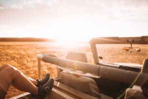 Guest relaxing during sunset near Namib Desert Lodge