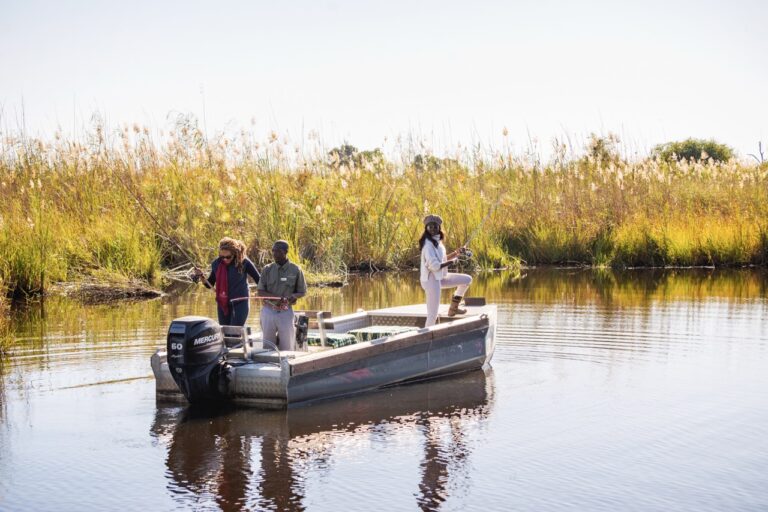 Guests fishing on a quiet Kwando River channel