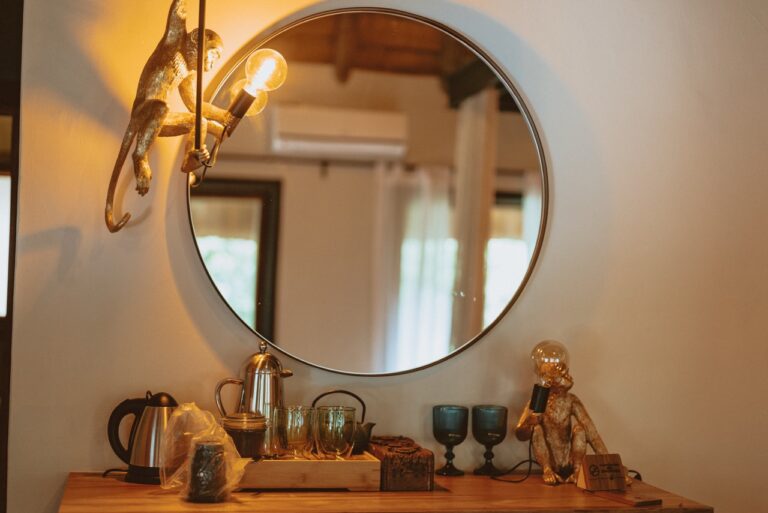 Tea station and vanity in a Namushasha River Lodge room