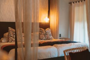 Namushasha River Lodge bedroom with mosquito net