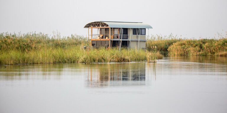 Private river villa viewed across a quiet Kwando channel