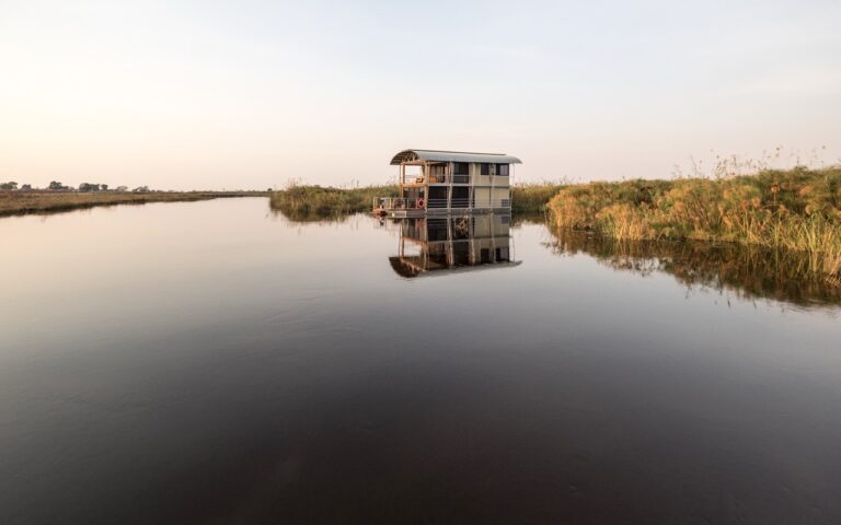 Private villa accommodation on a calm Kwando River channel