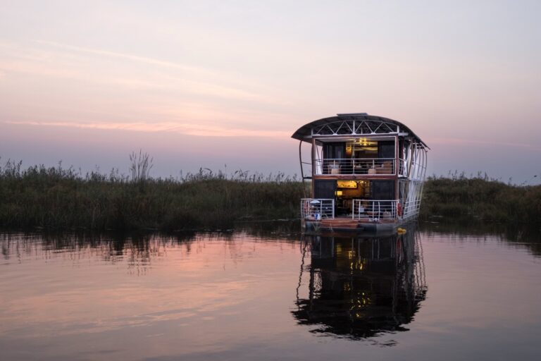 Private river villa and its reflection at dusk