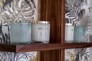 Candles and toiletries in the Namushasha River Villa bathroom