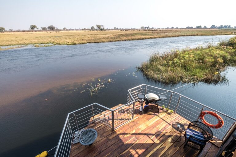 Lower deck and river equipment at Namushasha River Villa