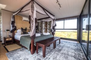 Mosquito-netted bedroom in the exclusive-use river villa