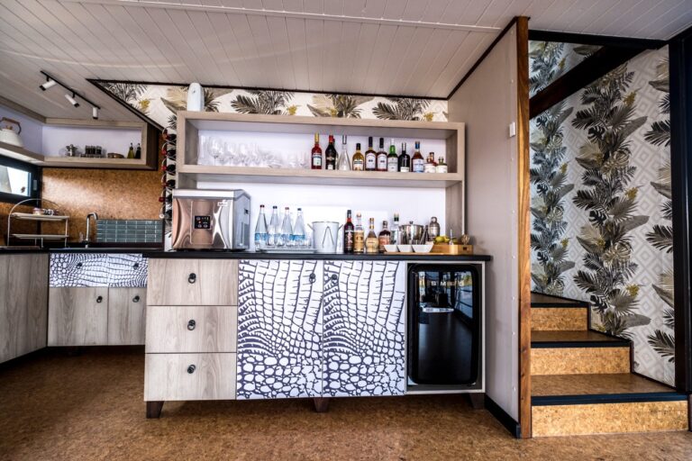 Kitchen and bar counter at Namushasha River Villa