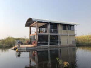 Namushasha River Villa floating on a quiet Kwando River channel