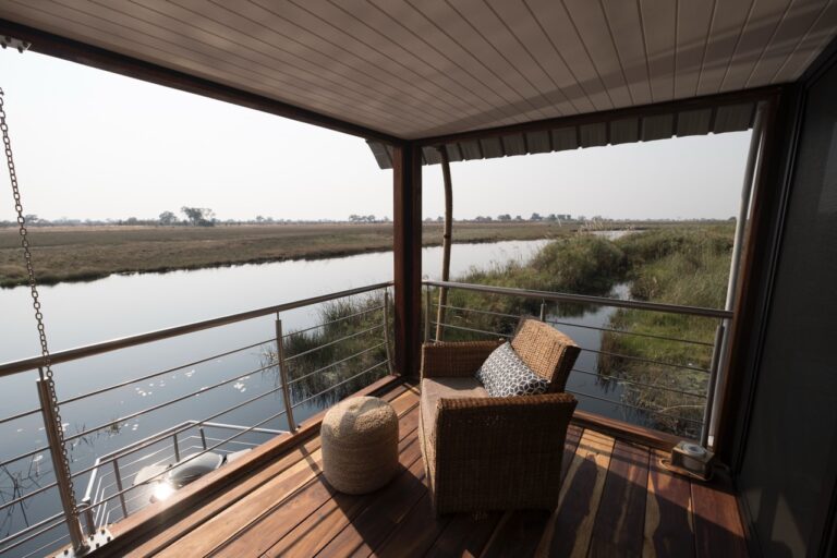 Private deck above a quiet Kwando River channel