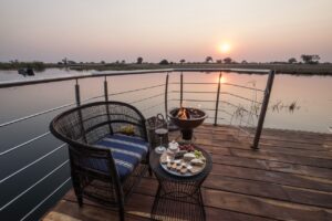Private sunset dining on the Namushasha River Villa deck