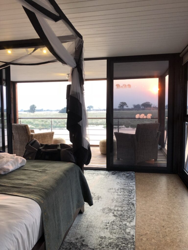Private river villa bedroom and deck at sunset in Namibia