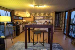 Kitchen and dining counter inside the private river villa