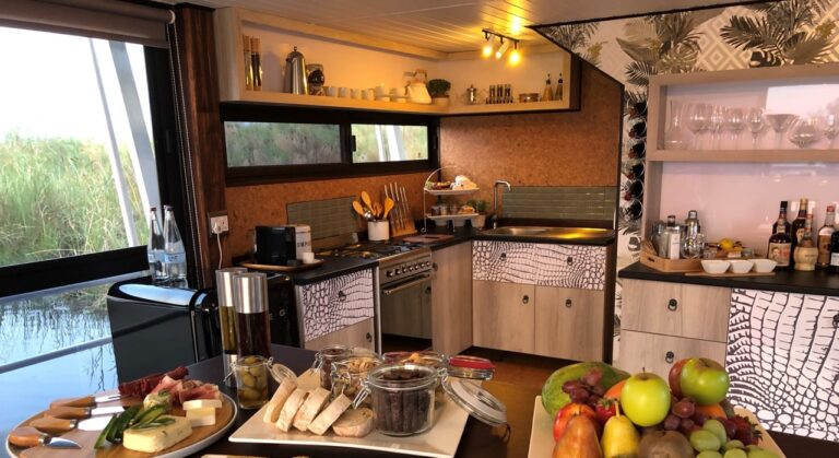 Kitchen and meal preparation area at Namushasha River Villa