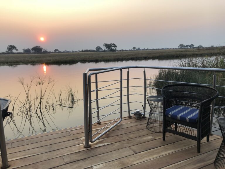Private deck at Namushasha River Villa during sunset