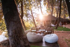 Riverside lounge seating at Omarunga Epupa-Falls Camp