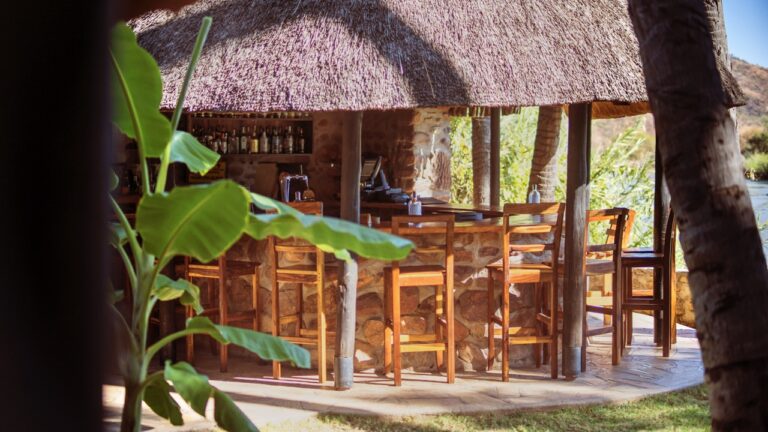 Open-air dining area at Omarunga Epupa-Falls Camp
