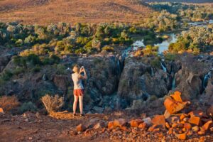 Visitors overlooking Epupa Falls from Omarunga accommodation