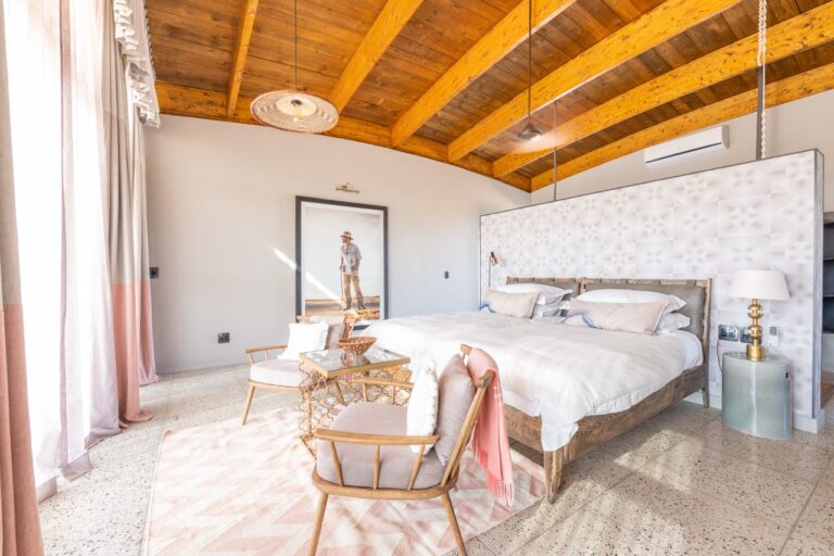 Bright bungalow bedroom at The Desert Grace