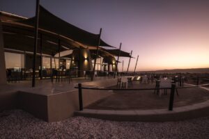 Main lodge terrace at The Desert Grace around sunset