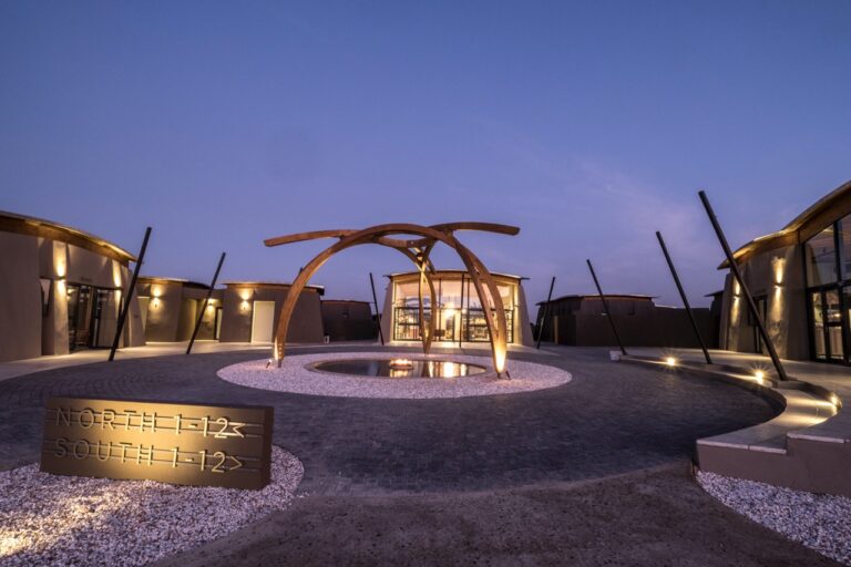 Illuminated courtyard at The Desert Grace lodge