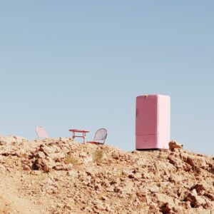 Pink wayfinding marker near The Desert Grace