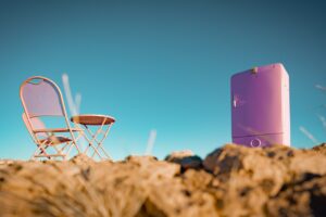 Pink chair and barrel in the Namib near The Desert Grace