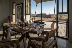 Restaurant seating with Namib views at The Desert Grace