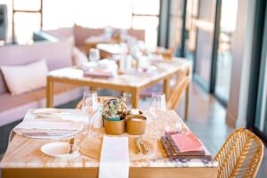 Restaurant table and pale-pink decor at The Desert Grace