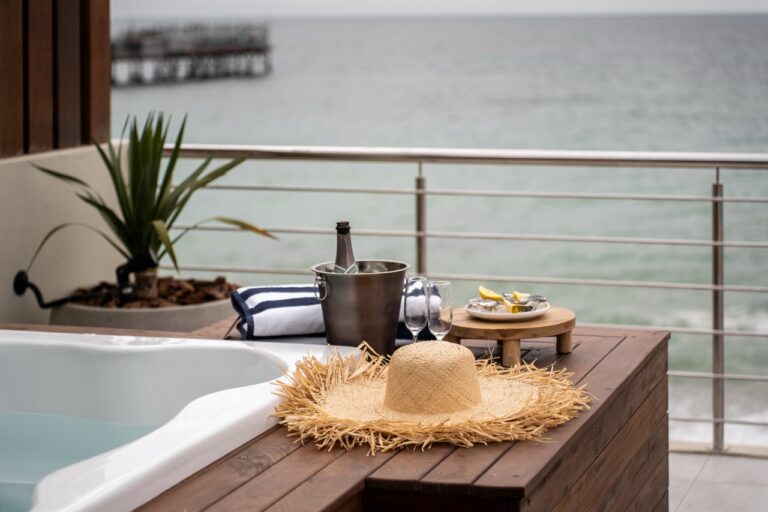 Welcome setup beside the hot tub at The Pearls Beach Pods