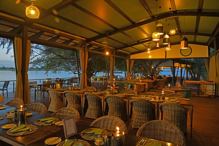 Open-air restaurant overlooking the Zambezi River at the lodge