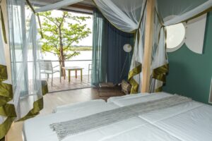 Zambezi Mubala Lodge bedroom with a view of the river