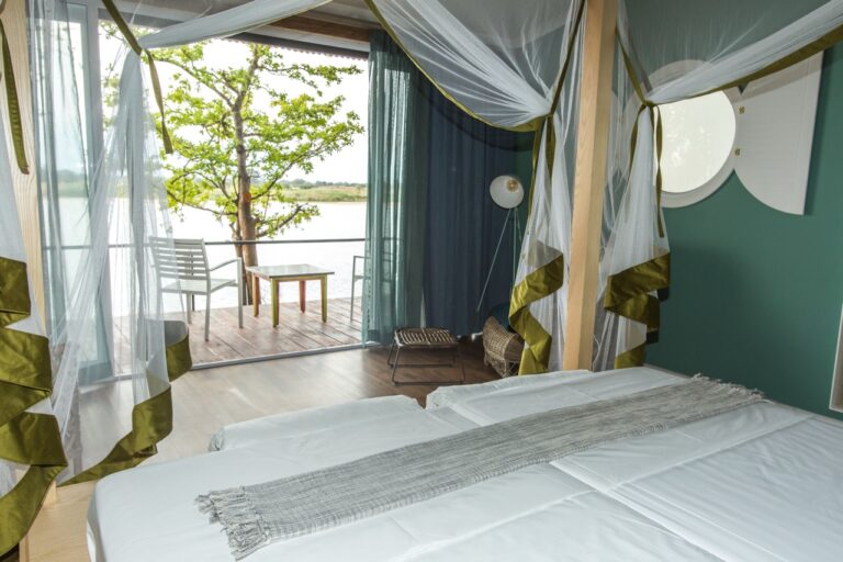 Zambezi Mubala Lodge bedroom with a view of the river