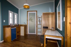 Vanity and refreshment area in a Zambezi Mubala Lodge room