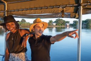 Guests enjoying a guided Zambezi River boat cruise