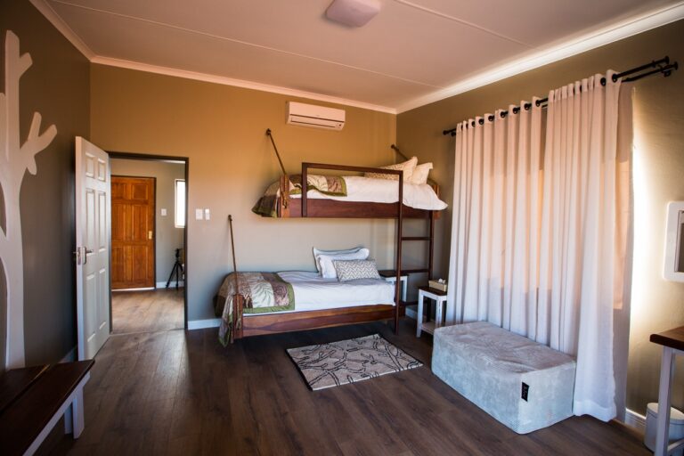 Family room with bunk beds at Kalahari Anib Lodge