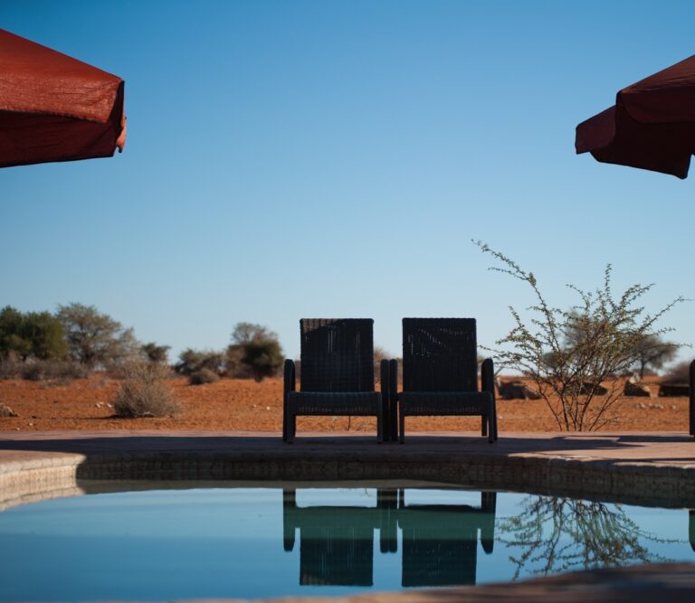 Sundowner chairs facing the Kalahari landscape