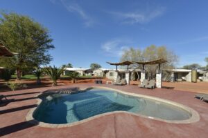 Kalahari Anib Lodge swimming pool and garden