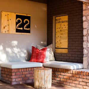 Shaded veranda seating at Kalahari Anib Lodge accommodation