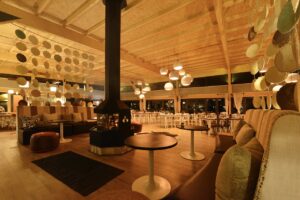Lounge and fireplace in the Kalahari Anib Lodge restaurant