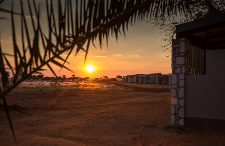 Sunset across the red-sand landscape at Kalahari Anib Lodge