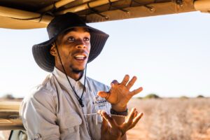 Kalahari Anib Lodge guide explaining the local landscape