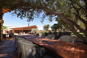 Shaded outdoor seating at Kalahari Anib Lodge