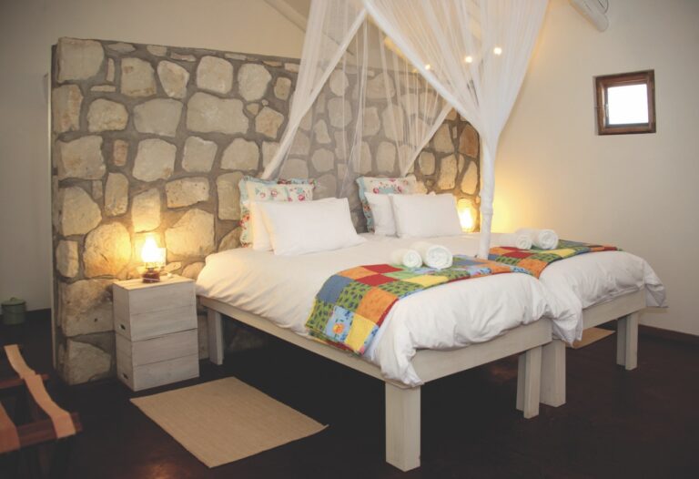 Double bungalow bedroom at Kalahari Farmhouse in Stampriet
