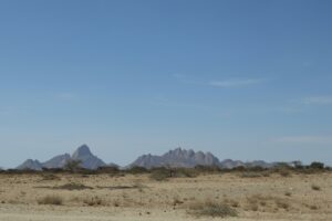 Spitzkoppe peaks rising above the open Namib gravel plains
