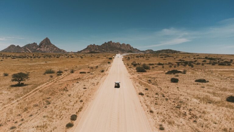 Vehicle travelling along the gravel road towards Spitzkoppe